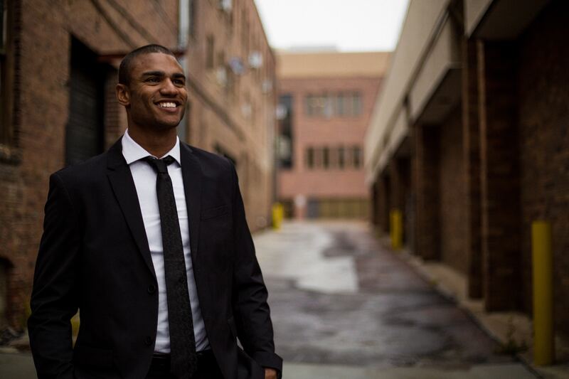 A man in a suit on a street
