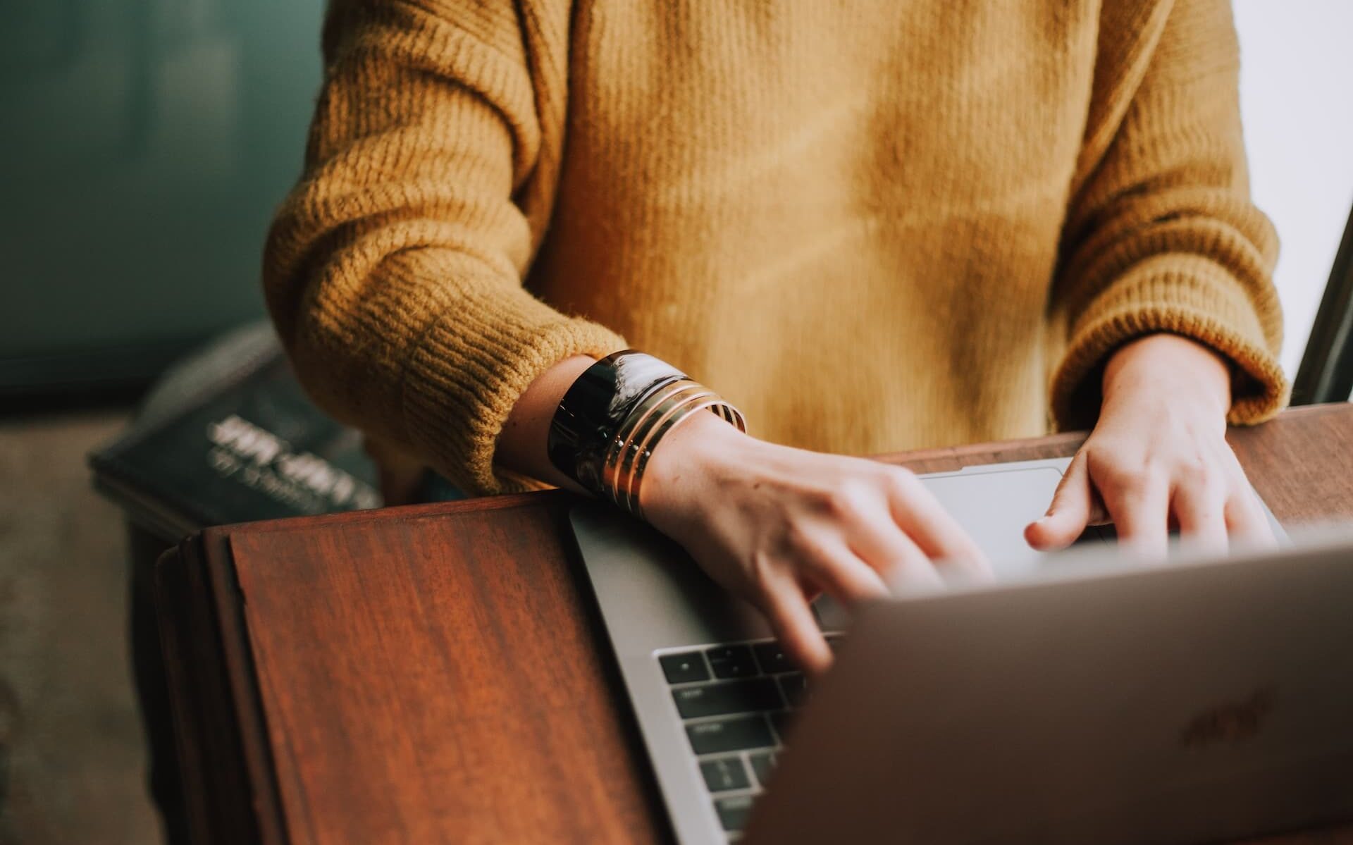 A woman working on a laptop